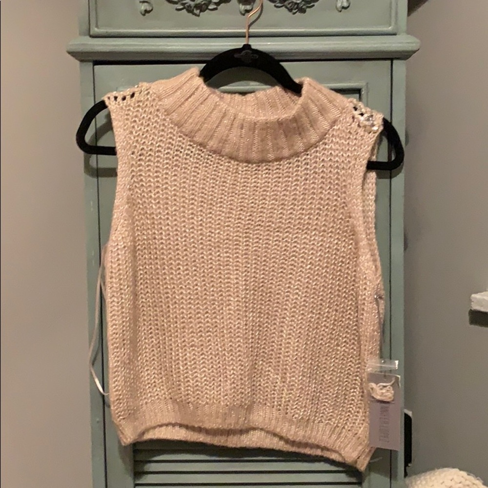 Sleeveless J-Lo sweater top